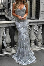 Women's Spaghetti Strap Sequin Evening Gown with Plunging V-Neck & Cross-Back Design - Close Up Bridge Pose