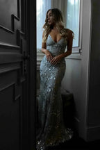 Women's Spaghetti Strap Sequin Evening Gown with Plunging V-Neck & Cross-Back Design - Dark Interior Pose