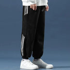 Black Men's Sherpa-Lined Jogger Pants with Striped Side Panels
