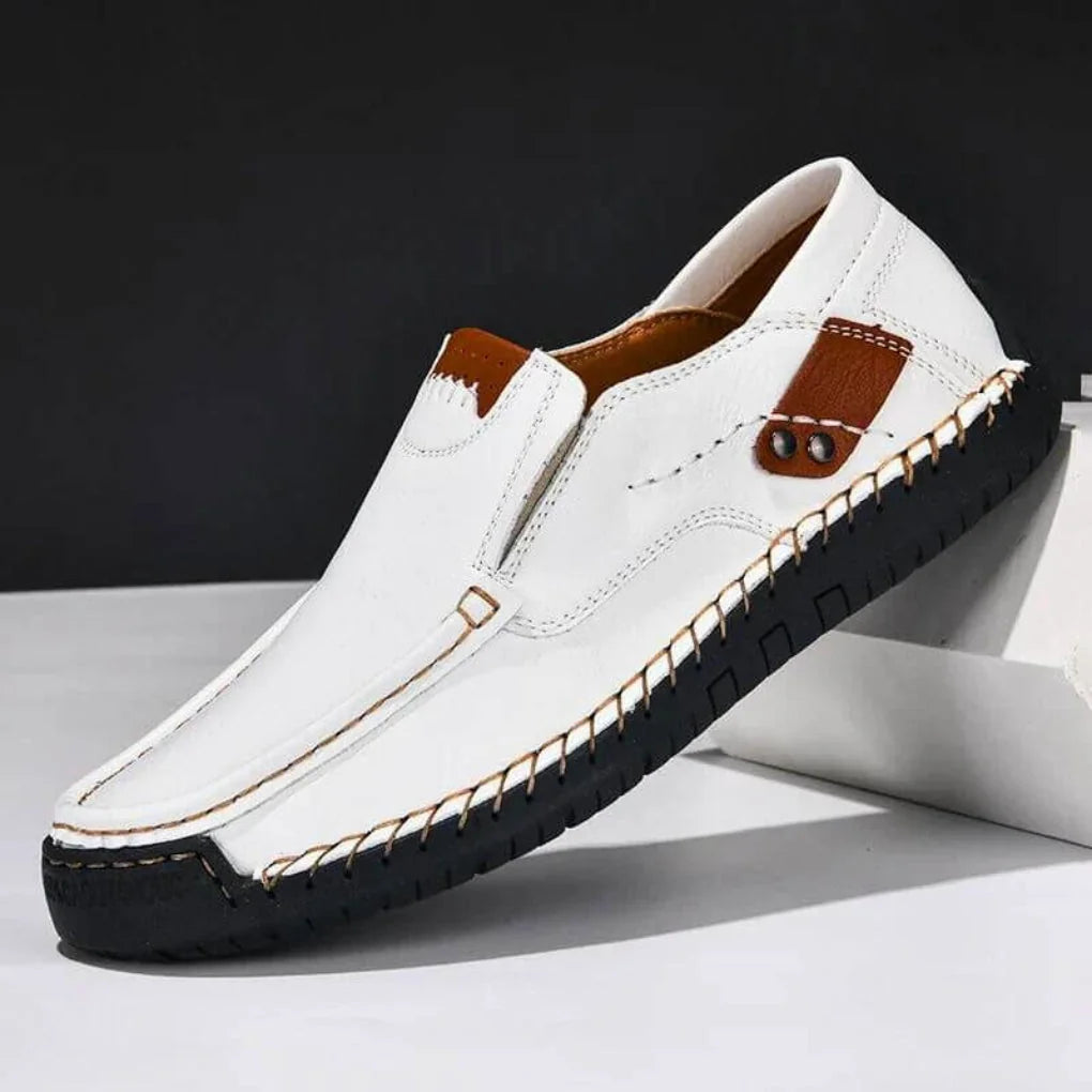 White Men's Casual Shoes with Arch Support — Meadow Slip-On Suede Loafers - Studio Background