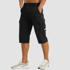 Black Men's Stretch Cargo Pants — Desmond Slim Fit Multi-Pocket Shorts - Front Studio