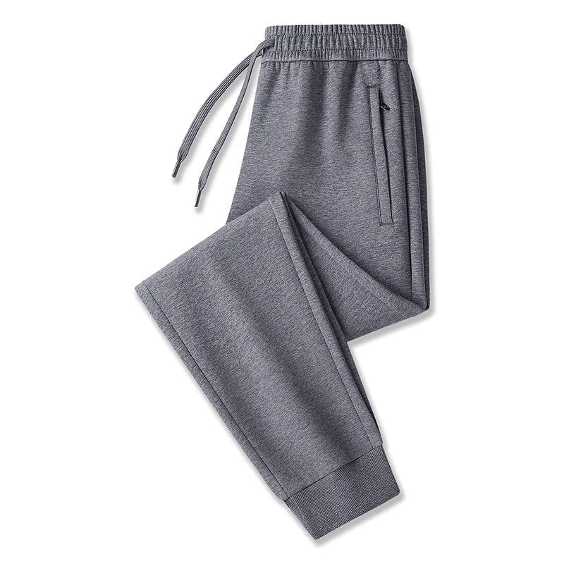 Dark gray, tight cuff Men's Tech Jogger Pants with Zip Pockets & Elastic Cuffs