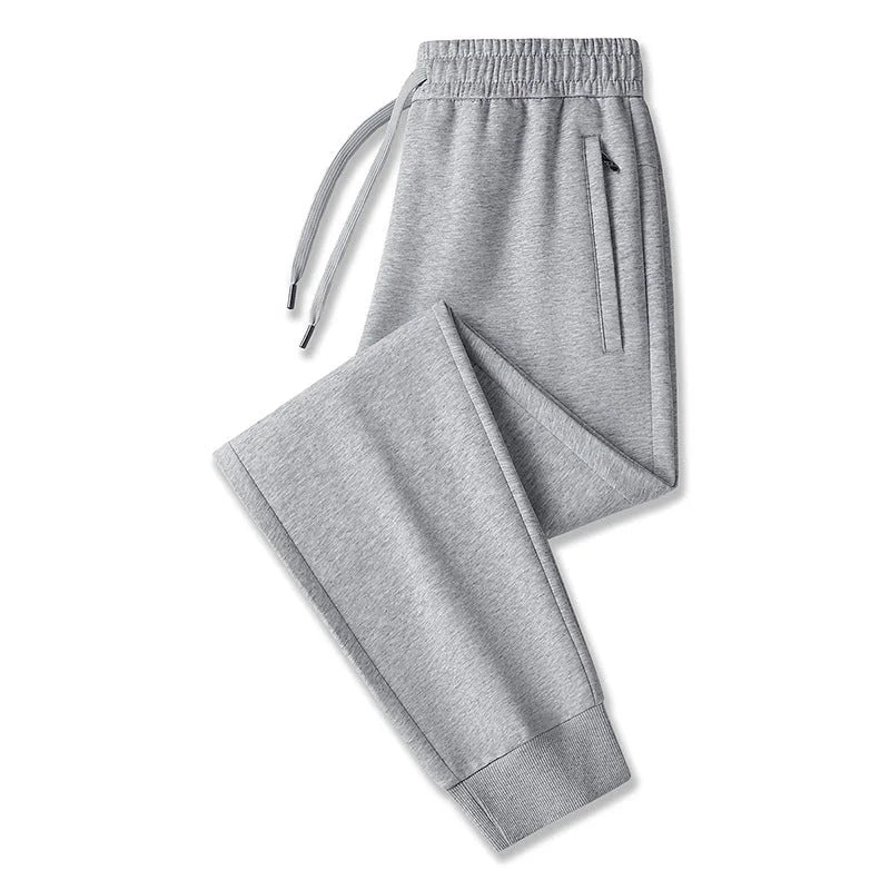 Light Grey Slim Fit Men's Tech Jogger Pants with Zip Pockets & Elastic Cuffs