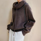 Brown Women's Merino Wool Turtleneck Sweater with Drawstring Hood & Oversized Fit - Side Pose
