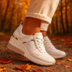 White Women's Wedge Shoes with Lace-Up Perforated Design & Metallic Trim — Fiona - Outdoor Autumn Pose