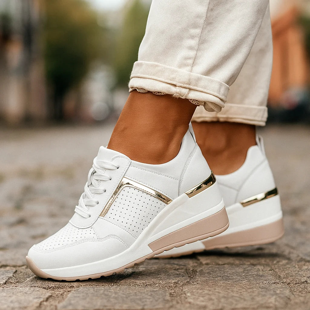 White Women's Wedge Shoes with Lace-Up Perforated Design & Metallic Trim — Fiona - Side Pose Walking