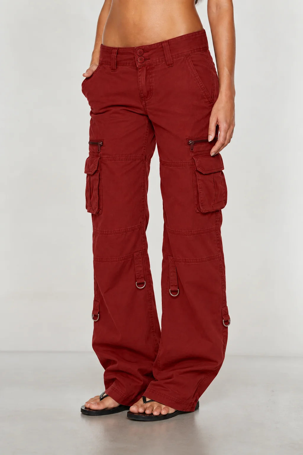 Burgundy Women's Wide-Leg Cargo Pants with Zip Pockets & Low-Rise Fit - Side Pose Studio