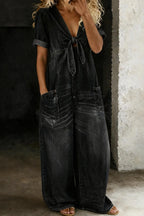 Black Women's Wide-Leg Denim Jumpsuit — Bess Tie-Front V-Neck Pockets - Front Pose