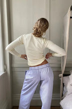 Purple Women's Cotton Lounge Pants with Elastic Waist & Wide-Leg Fit — Nadia - Back Pose Hands Hip
