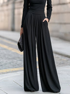 Black Women's Wide Leg Jumpsuit with Boat Neckline & Pleated High-Waist - Front Pants Detail