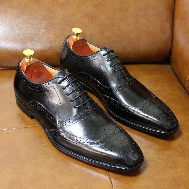 Black Men's Wingtip Oxford Dress Shoes — Hugo Lace-Up Leather Brogue - Side Pose Couch