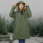 Green Women's Raincoat with Hood — Amara Lightweight Waterproof Longline - Front Hood Up