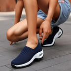 Blue Women's Slip-On Shoes with Cushioned Platform Sole & Breathable Knit Design - Crouching Tie Pose