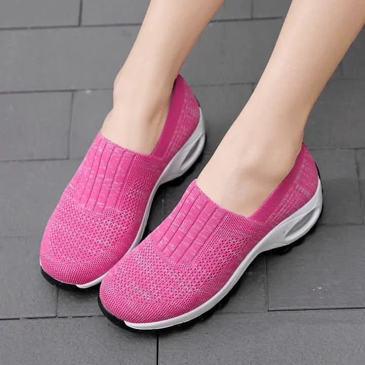 Pink Women's Slip-On Shoes with Cushioned Platform Sole & Breathable Knit Design - Front Closeup Pair