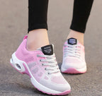 Pink Women's Lightweight Walking Shoes — Logan Athletic Cushioned Lace-Up - Model Walking
