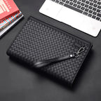 Black Women's Woven Faux Leather Clutch Bag with Wristlet Strap — Victoria - Side Angle
